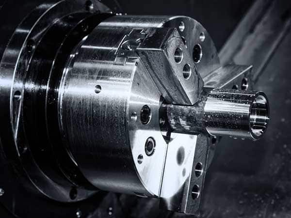 metal gear turning, CNC milling machine close-up Lavorazione-di-metalli-di-precisione-in-serie-modena-sassuolo